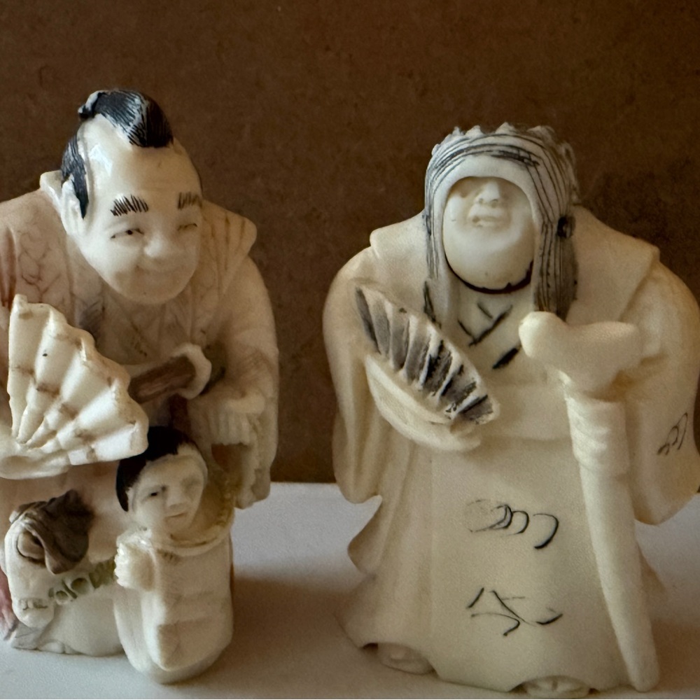 Elegant Cream and Black Figurine Set